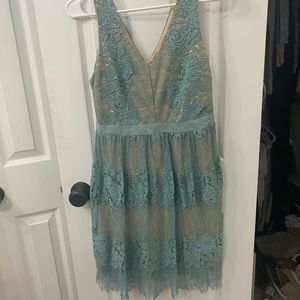 Francesca‘s size small light blue teal with nude lining dress excellent used co